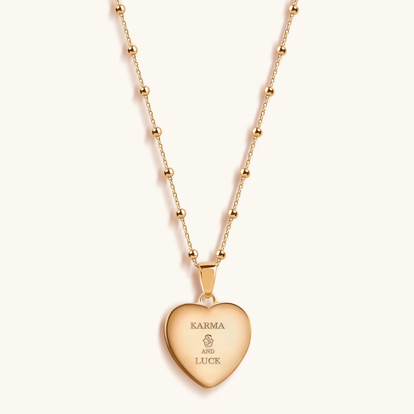 Harmonious Emotions - Mother Of Pearl Heart Evil Eye Necklace