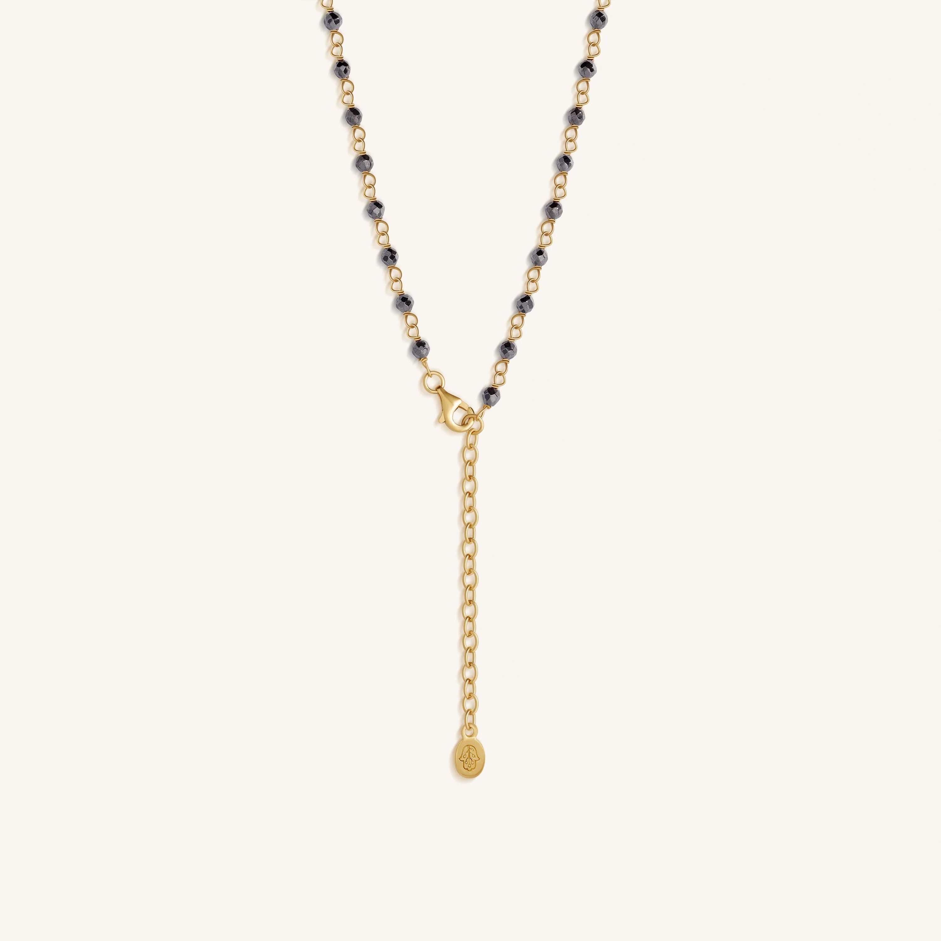 Celestial Flow – Hamsa Hematite & Aquamarine Necklace
