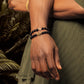 Celebrate Life - Matte Onyx Skull Charm Bracelet