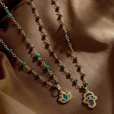 Celestial Flow – Hamsa Hematite & Aquamarine Necklace
