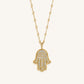 Inspired Action Gold Evil Eye & Hamsa Hand Necklace