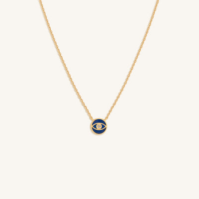 Evil Eye with against lapis lazuli circle with cubic zirconia center on gold-plated silver chain