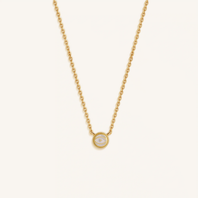 Luminous Sentinel - White Quartz April Birthstone Evil Eye Gold Necklace