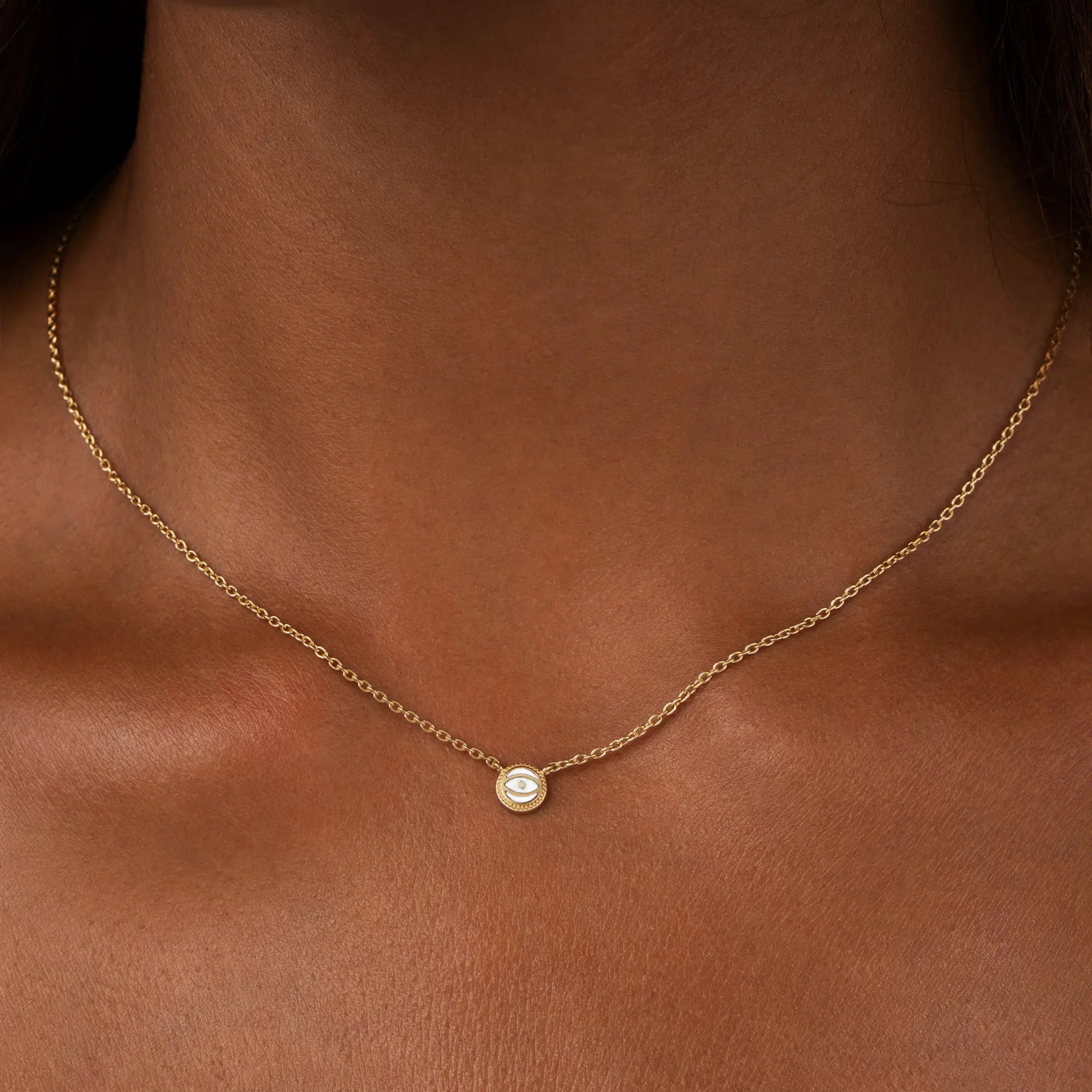 Luminous Sentinel - White Quartz April Birthstone Evil Eye Gold Necklace