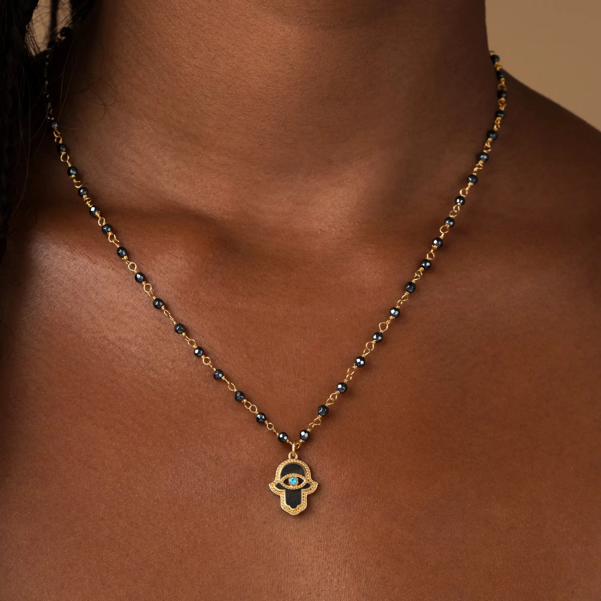Celestial Flow – Hamsa Hematite & Aquamarine Necklace
